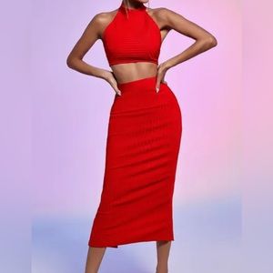 Red two piece outfit never worn. Size Small